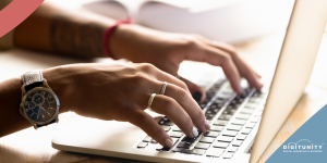 hands on laptop computer keyboard