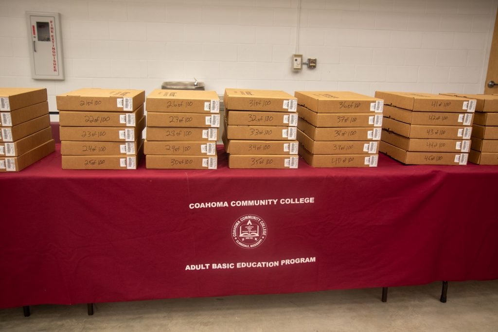 Table with boxes stacked on top