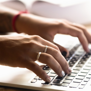 Device Ownership Matters hands on laptop computer keyboard